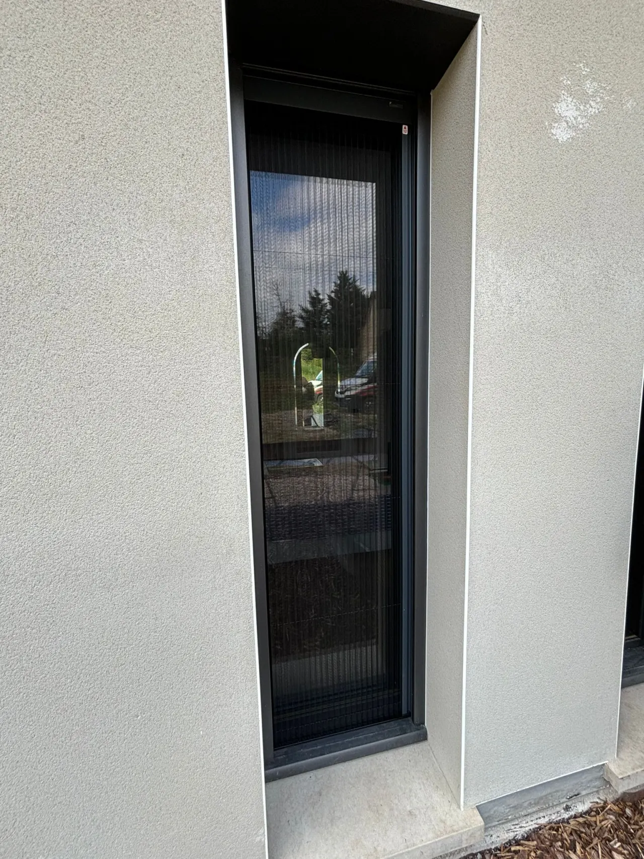 Moustiquaire enroulable avec ossature en aluminium laquée gris anthracite Toile fibre de verre grise